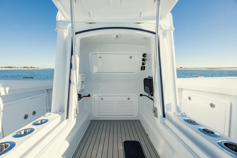 Slide: The Image of 2025 Yellowfin 32 boat interior with sleek design and ocean view. - 32
