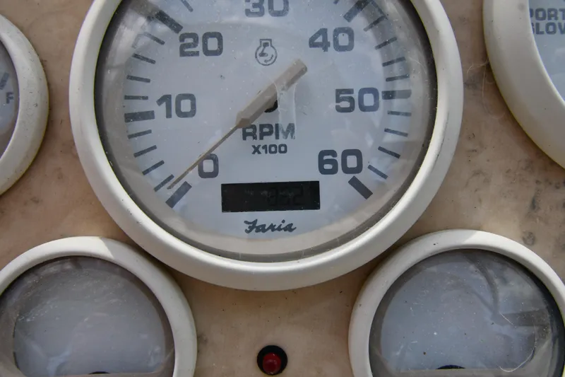 Slide: The Image of Close-up of 1998 Cruisers Yachts 3870 Express RPM gauge. - 15