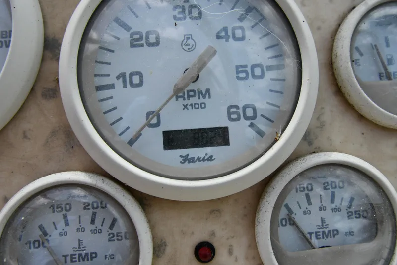 Slide: The Image of Close-up of 1998 Cruisers Yachts 3870 Express dashboard gauges. - 16