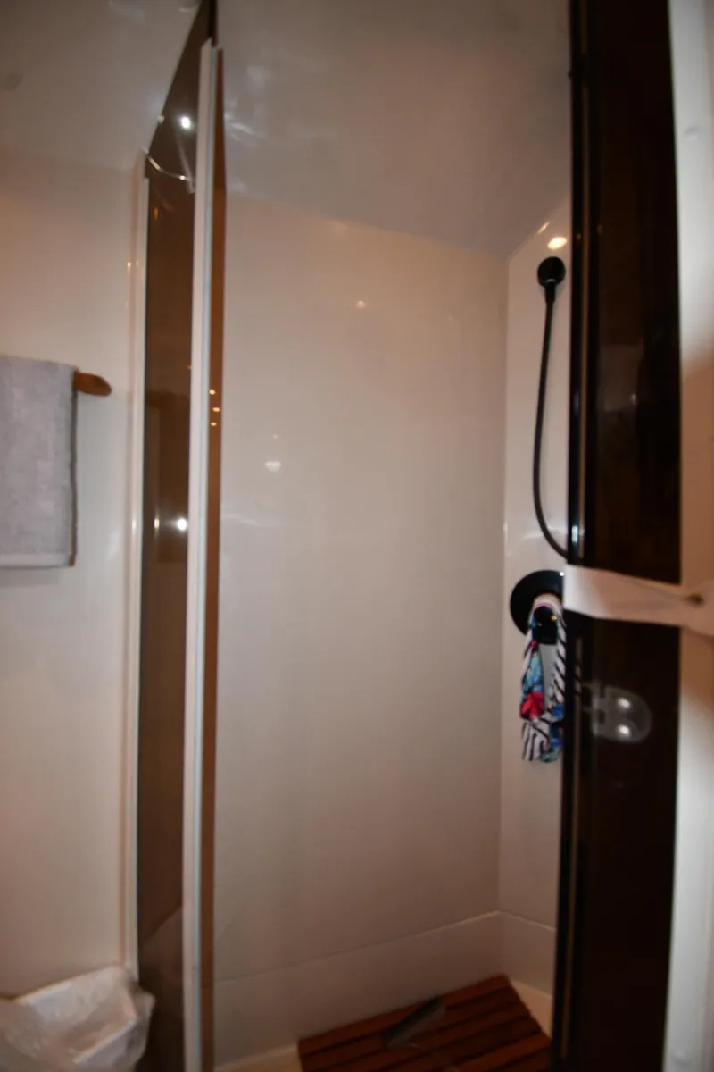 Slide: The Image of 1998 Cruisers Yachts 3870 Express shower area with modern fixtures. - 44