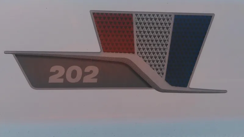 Slide: The Image of 202 Fisherman logo on a 2021 Wellcraft boat. - 11