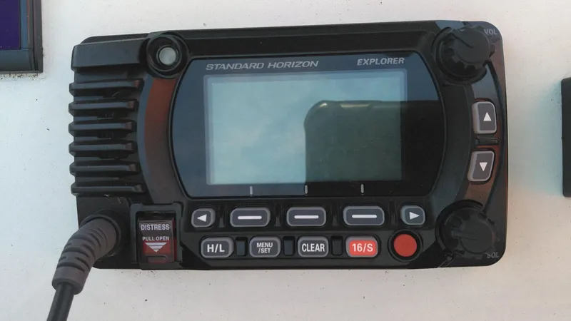 Slide: The Image of Standard Horizon Explorer radio on 2021 Wellcraft 202 Fisherman boat. - 16