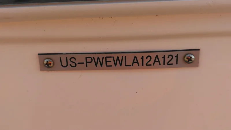 Slide: The Image of Hull Identification Number (HIN) plate on a 2021 Wellcraft 202 Fisherman boat. - 6