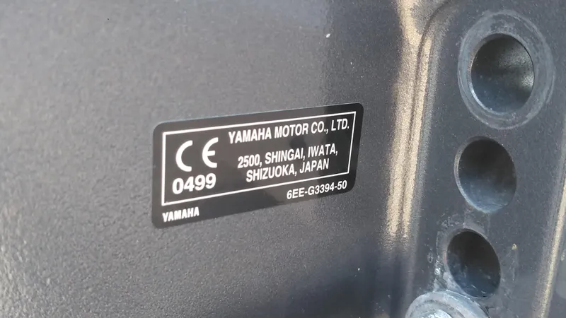 Slide: The Image of Yamaha motor label on a 2021 Wellcraft 202 Fisherman boat. - 7