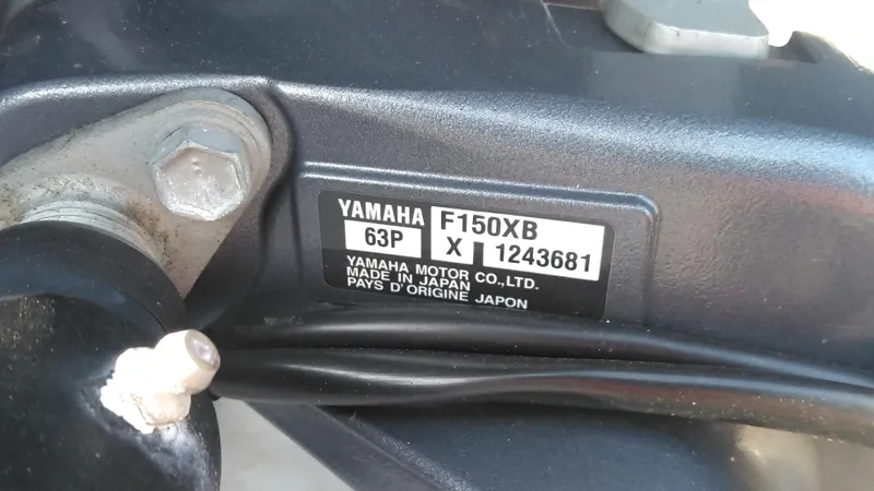Slide: The Image of Yamaha F150XB engine label on a 2021 Wellcraft 202 Fisherman boat. - 8