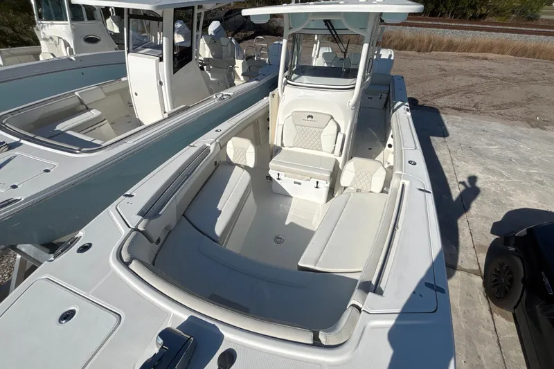 Slide: The Image of 2026 World Cat 295 CC boat with spacious seating and modern design. - 5