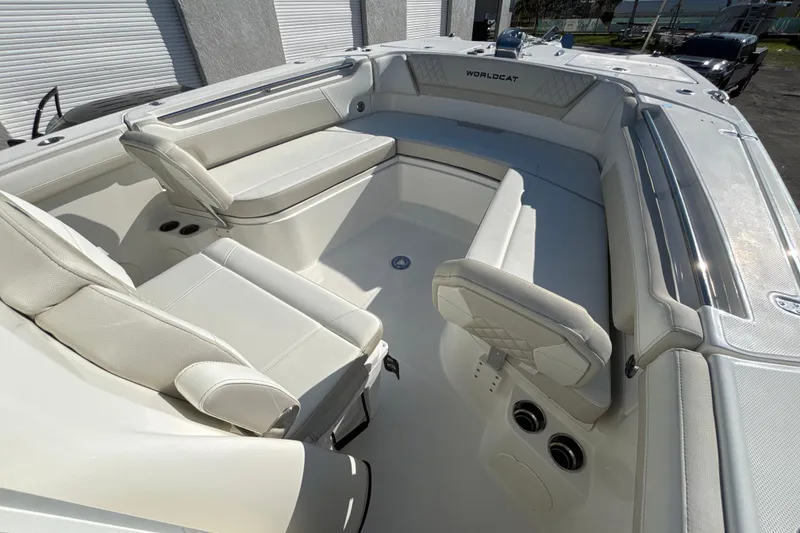 Slide: The Image of Luxurious seating area on 2026 World Cat 295 CC boat, featuring elegant white upholstery. - 8
