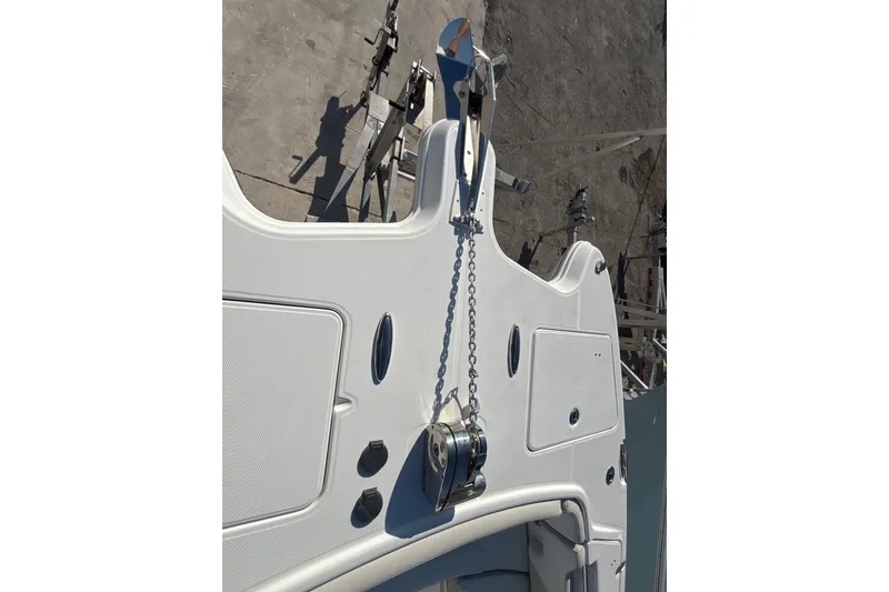 Slide: The Image of 2026 World Cat 295 CC boat deck with anchor chain and winch system. - 9