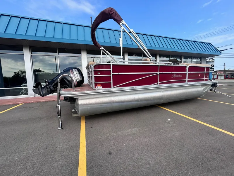 Slide: The Image of 2015 Berkshire 210CL CTS pontoon boat in parking lot. - 5