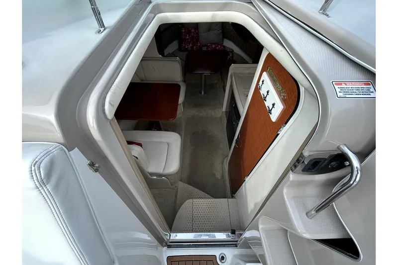 Slide: The Image of Interior view of 2005 Sea Ray 280 Sundancer cabin with seating and table. - 10