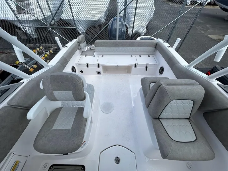 Slide: The Image of 2023 Sea Fox 226 Traveler boat interior with gray seating and spacious layout. - 15