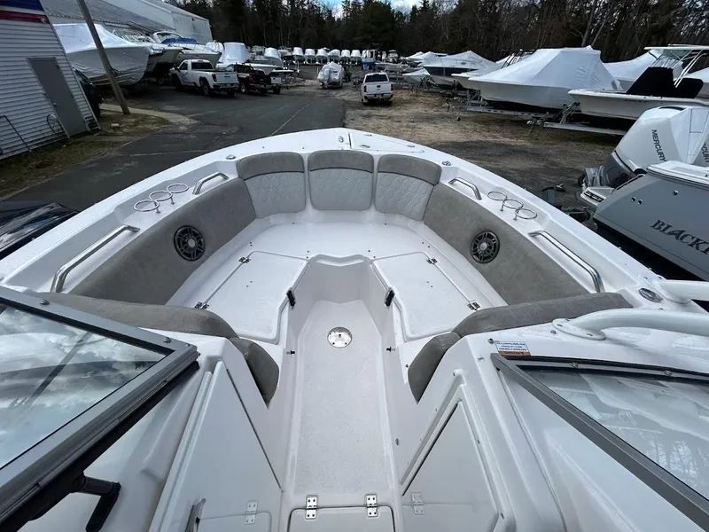 Slide: The Image of 2023 Sea Fox 226 Traveler boat interior with spacious seating and modern design. - 17