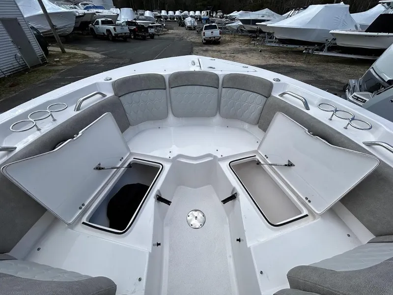 Slide: The Image of 2023 Sea Fox 226 Traveler boat interior with open storage compartments and seating. - 18