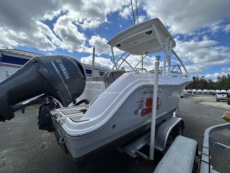 Slide: The Image of 2023 Sea Fox 226 Traveler boat with Yamaha engine on trailer under cloudy sky. - 3