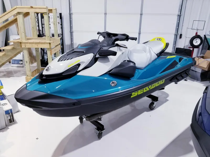 The Image of 2024 Sea-Doo GTI SE 130 jet ski in a showroom. - 1