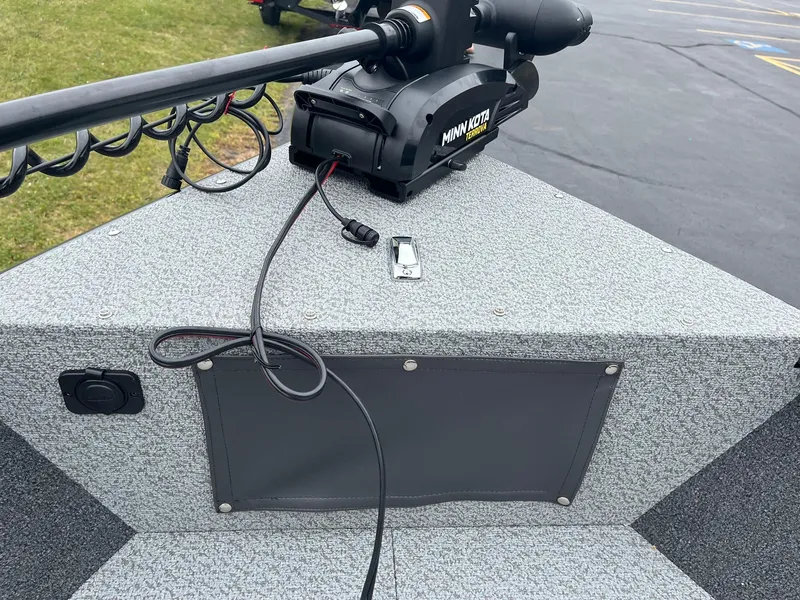 Slide: The Image of 2025 Lund 1650 Rebel XL SS boat with Minn Kota trolling motor. - 17