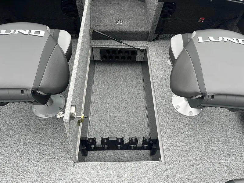 Slide: The Image of 2025 Lund 1875 Tyee boat interior with storage compartment and seating. - 16