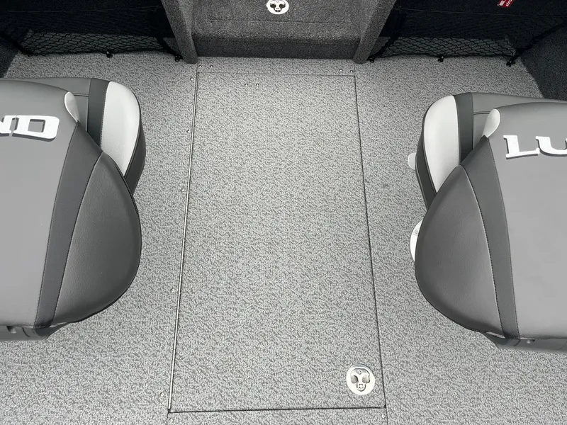 Slide: The Image of 2025 Lund 1875 Tyee boat interior with gray carpet and two seats. - 19