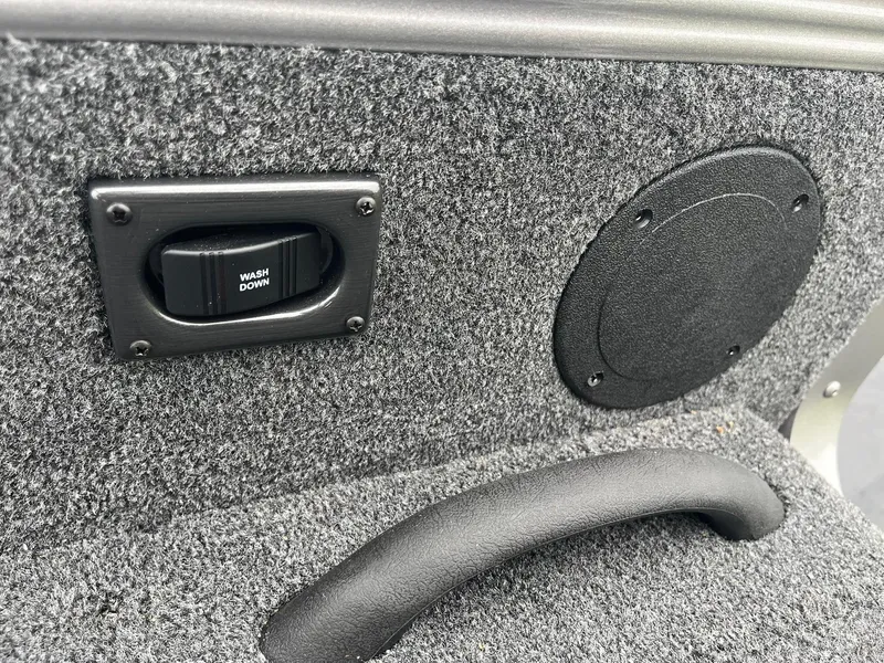 Slide: The Image of Interior detail of 2025 Lund 1875 Tyee boat with washdown switch and speaker. - 23
