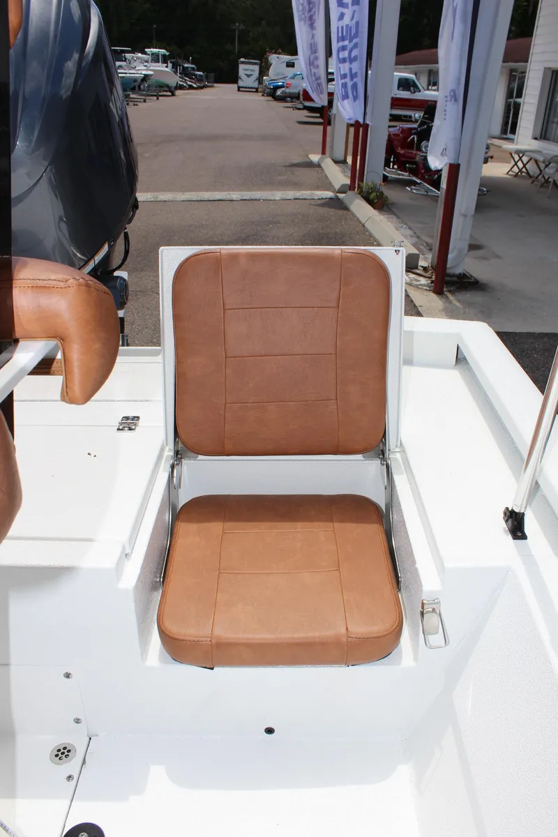 Slide: The Image of 2024 Avid 21 Fusion boat with brown leather seat. - 10