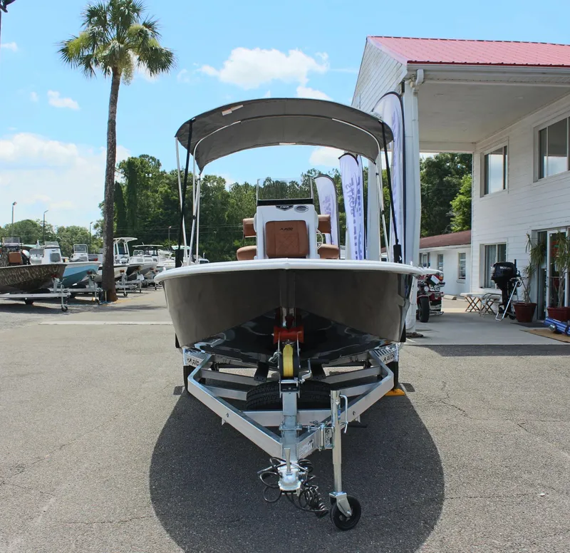 Slide: The Image of 2024 Avid 21 Fusion boat on trailer at dealership. - 3