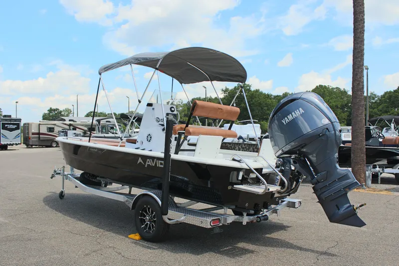Slide: The Image of 2024 Avid 21 Fusion boat with Yamaha outboard motor on trailer. - 8