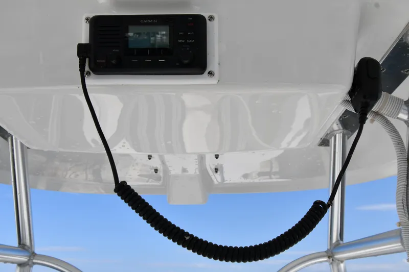 Slide: The Image of 2021 Eastern 248 Center Console boat radio and control panel. - 11
