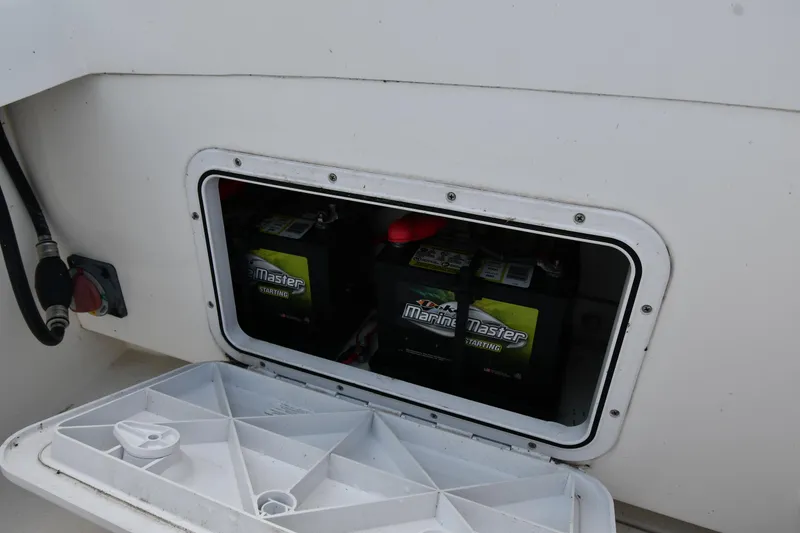 Slide: The Image of Battery compartment of 2021 Eastern 248 Center Console boat. - 33