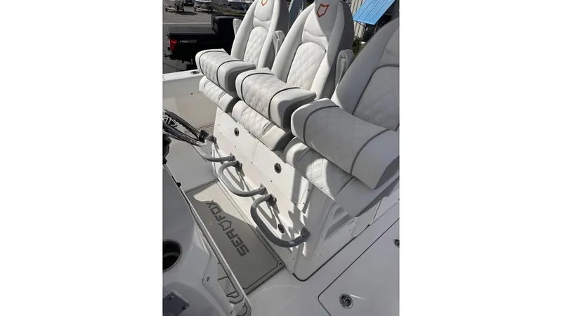 Slide: The Image of 2025 Sea Fox 328 Commander boat seats and deck area. - 19