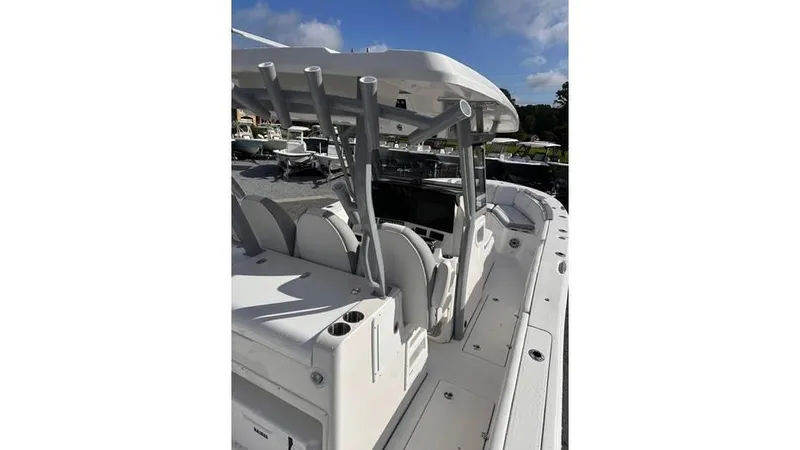 Slide: The Image of 2025 Sea Fox 328 Commander boat, rear seating and helm station view. - 21