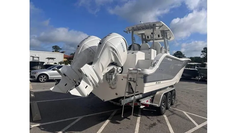 Slide: The Image of 2025 Sea Fox 328 Commander boat with dual outboard engines on trailer. - 7