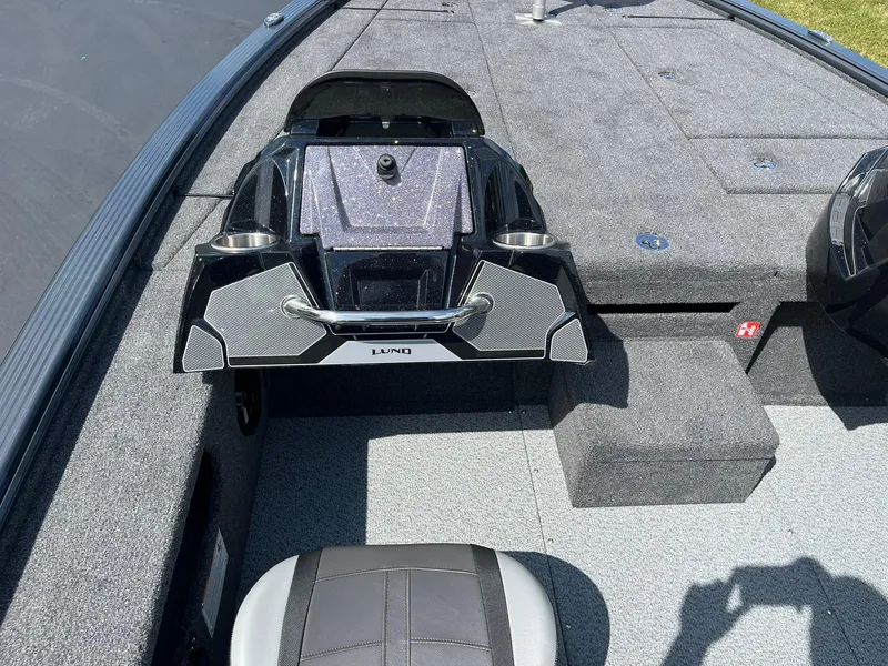 Slide: The Image of 2025 Lund 2075 Pro-V Bass XS boat interior with seating and console. - 16