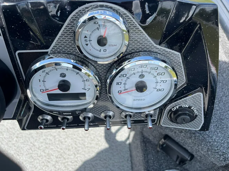 Slide: The Image of Dashboard of 2025 Lund 2075 Pro-V Bass XS boat with gauges and controls. - 18