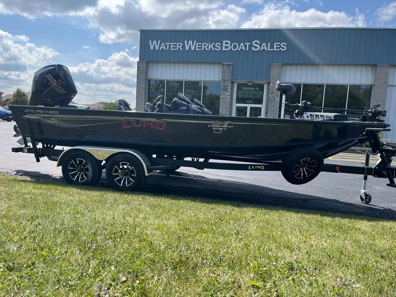 Slide: The Image of 2025 Lund 2075 Pro-V Bass XS boat at Water Werks Boat Sales dealership. - 2