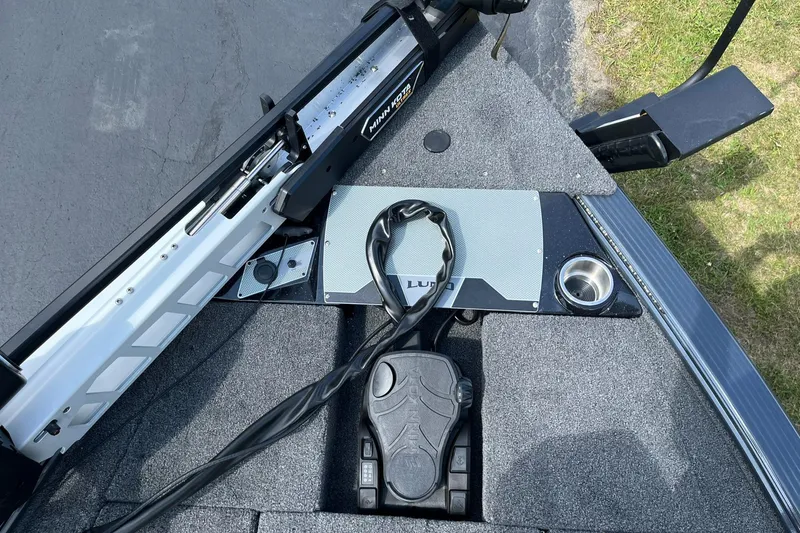 Slide: The Image of 2025 Lund 2075 Pro-V Bass XS boat deck with trolling motor and foot pedal. - 24