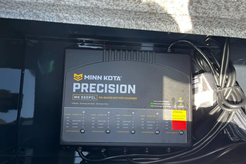 Slide: The Image of Minn Kota Precision MK 550PC battery charger in 2025 Lund 2075 Pro-V Bass XS boat. - 33