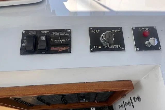 Slide: The Image of Control panel of a 1996 Custom Bolger PH Shoal-draft Ketch with bow thruster and sync switch. - 17
