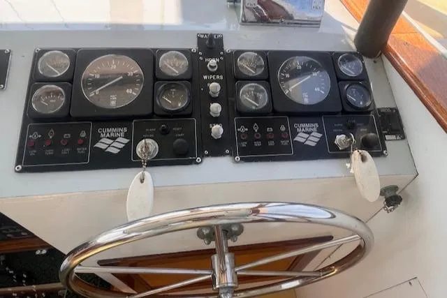 Slide: The Image of Control panel of 1996 Custom Bolger PH Shoal-draft Ketch with Cummins Marine gauges. - 18