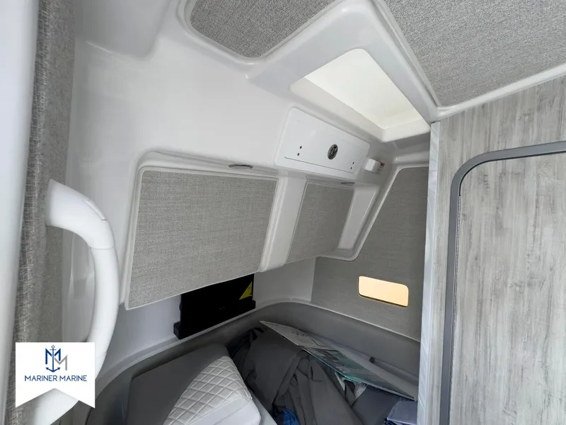 Slide: The Image of 2024 Regulator 37 cabin interior with modern design and comfortable seating. - 36