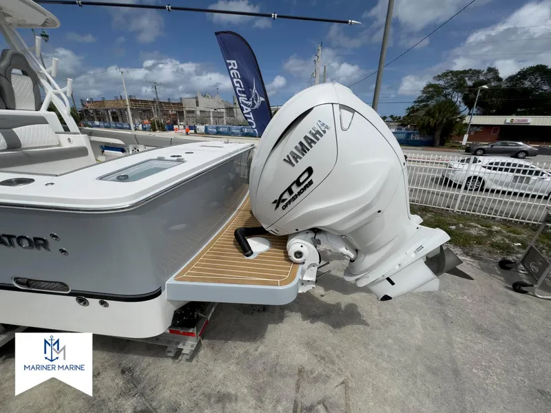 Slide: The Image of 2024 Regulator 37 boat with Yamaha XTO engine displayed at Mariner Marine. - 47