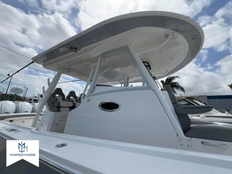 Slide: The Image of 2024 Regulator 37 boat with sleek design and modern features, showcased at Mariner Marine. - 6