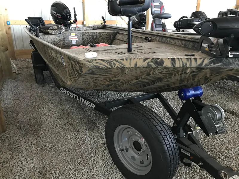 Slide: The Image of 2022 Crestliner 1760 Retriever Jon boat on trailer in storage. - 6