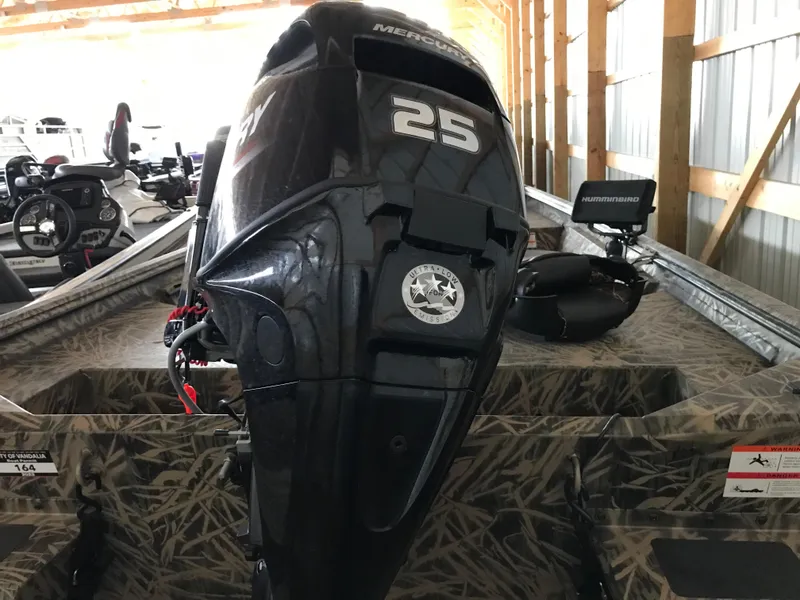 Slide: The Image of 2022 Crestliner 1760 Retriever Jon boat with Mercury 25 outboard motor. - 8