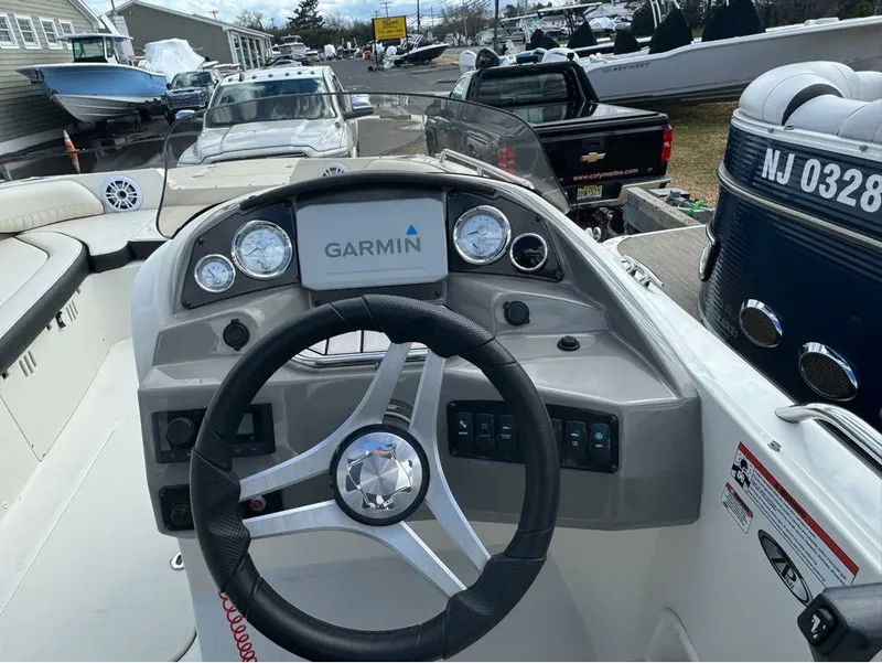Slide: The Image of 2022 Stingray 192 SC boat dashboard with Garmin navigation system. - 6