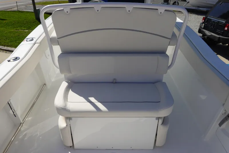 Slide: The Image of 2025 Sea Hunt Ultra 239 SE boat interior with storage compartment. - 11
