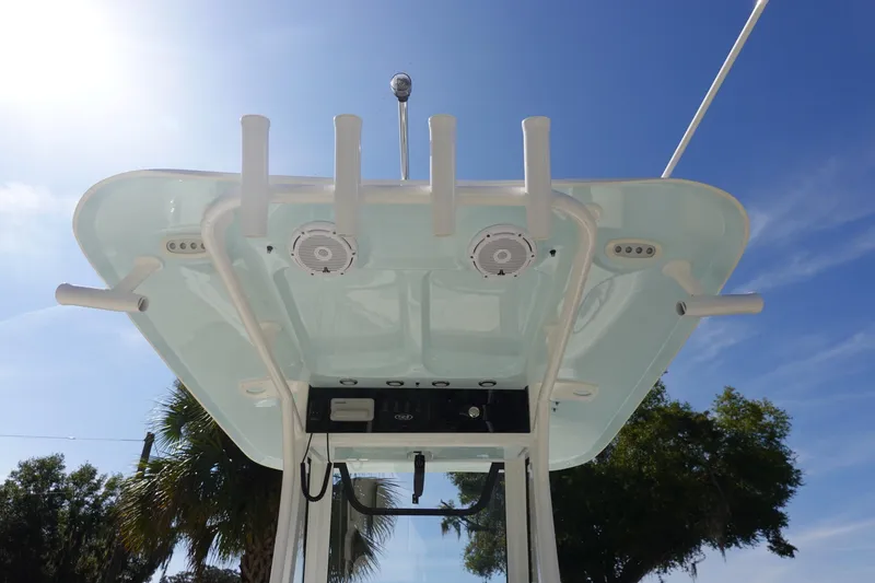 Slide: The Image of 2025 Sea Hunt Ultra 239 SE boat seat with white cushioned upholstery. - 14