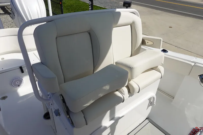 Slide: The Image of Storage compartment on a 2025 Sea Hunt Ultra 239 SE boat, featuring organized drawers. - 15