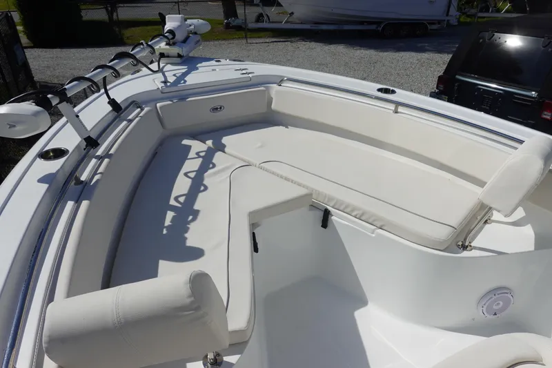 Slide: The Image of 2025 Sea Hunt Ultra 239 SE boat with Garmin trolling motor on deck. - 24
