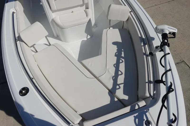 Slide: The Image of 2025 Sea Hunt Ultra 239 SE boat with mounted trolling motor. - 25