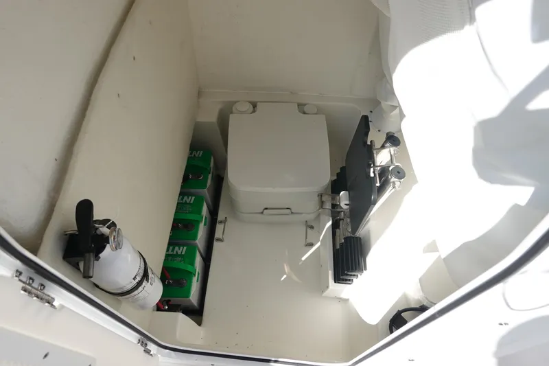 Slide: The Image of 2025 Sea Hunt Ultra 239 SE boat storage compartments, open and spacious design. - 30